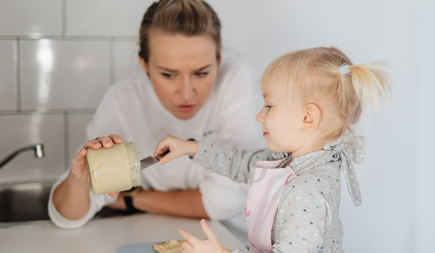 Mother holding baby symbolizing emotional honesty and learning to speak your truth