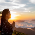 Woman standing outdoors at sunrise representing courage and healing